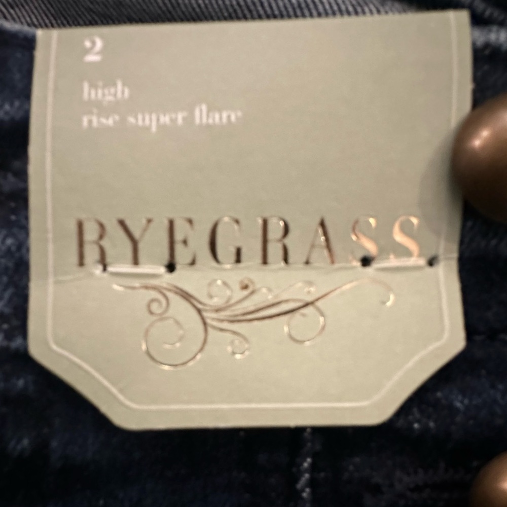 JCPenney Dark Blue Buttoned Flare Jeans - Picture 3 of 9
